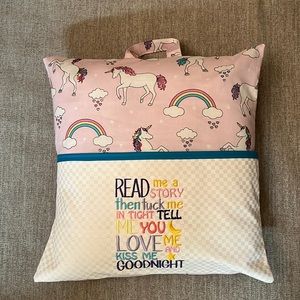Handmade “Unicorn and Rainbows” reading pillow with pocket.